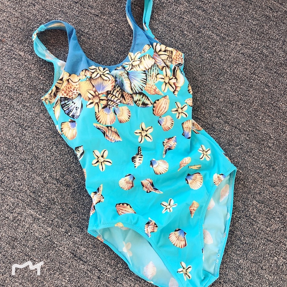 Waikiki blue one piece swimsuit with shell pattern